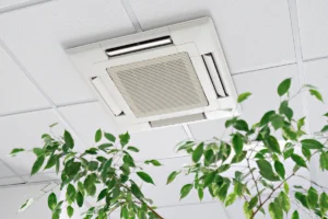 commercial air purifiers and ceiling-mounted HVAC system in an office space